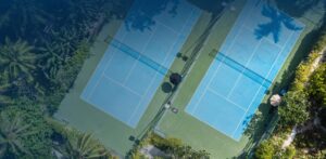 Aerial view of newly paved/painted tennis court