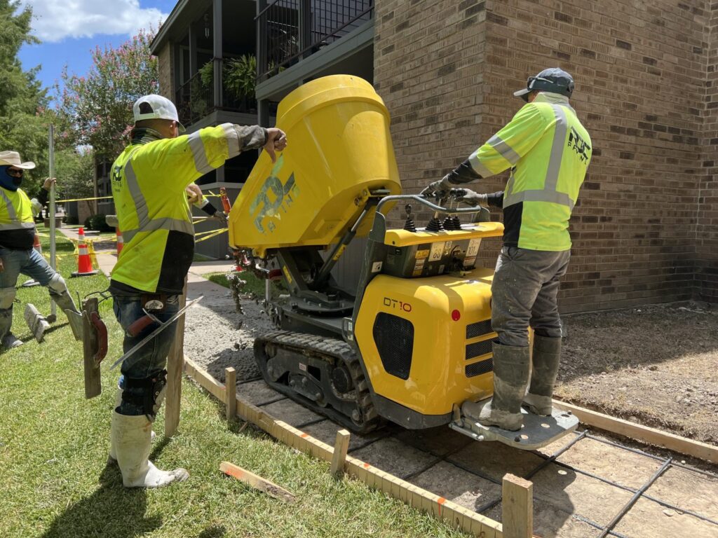 RDC Team laying concrete for a new sidewalk.