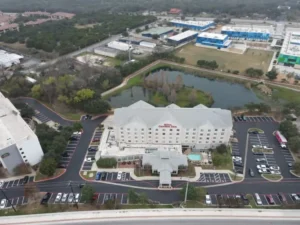 A hotel parking lot gets complete redone with new striping and asphalt.