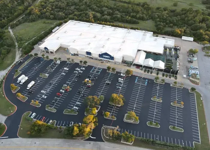 Lowe's Parking Lot: New asphalt paving and striping.