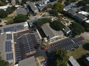 Redoing a large parking lot with solar panels.