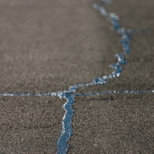 Close up of crack sealing.