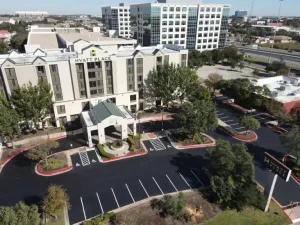 The Hyatt looks amazing with a new asphalt lot and stripes.