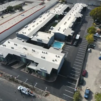 Apartment complex receives new striping and asphalt pavement.