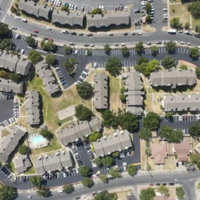 Apartment complex receives new striping and asphalt pavement.